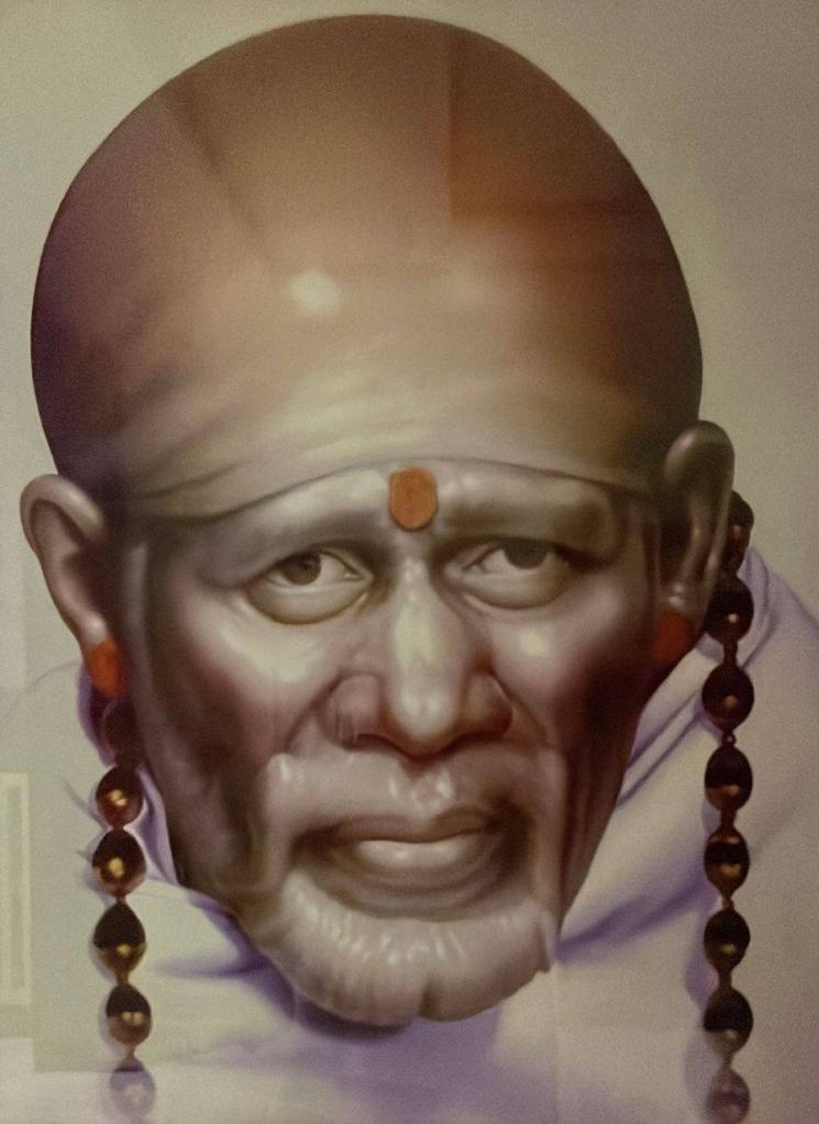 Baba Sai with rolling eyes